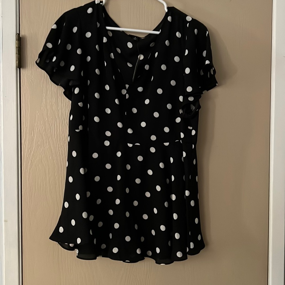 Black and white polka dotted top